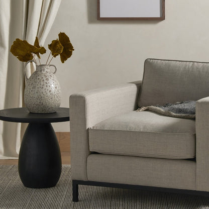 Rounded Black Ash Wood End Table - Styled View