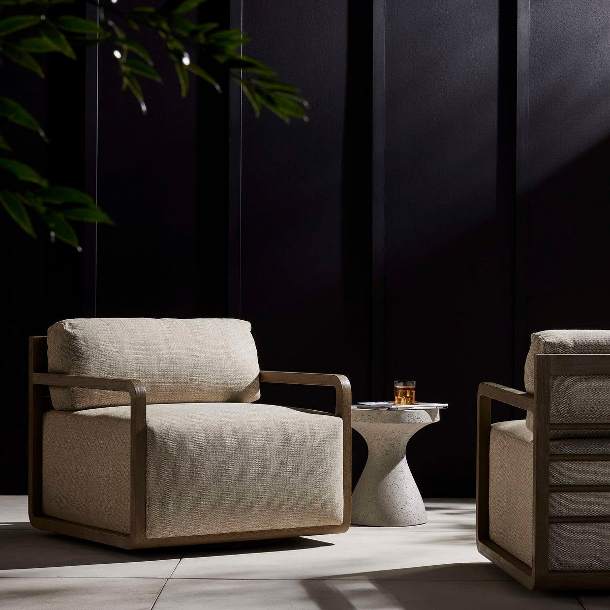 Open Teak Frame Outdoor Swivel Chair - Styled View
