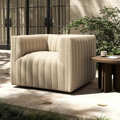 Channel-Tufted Outdoor Swivel Club Chair - Styled View