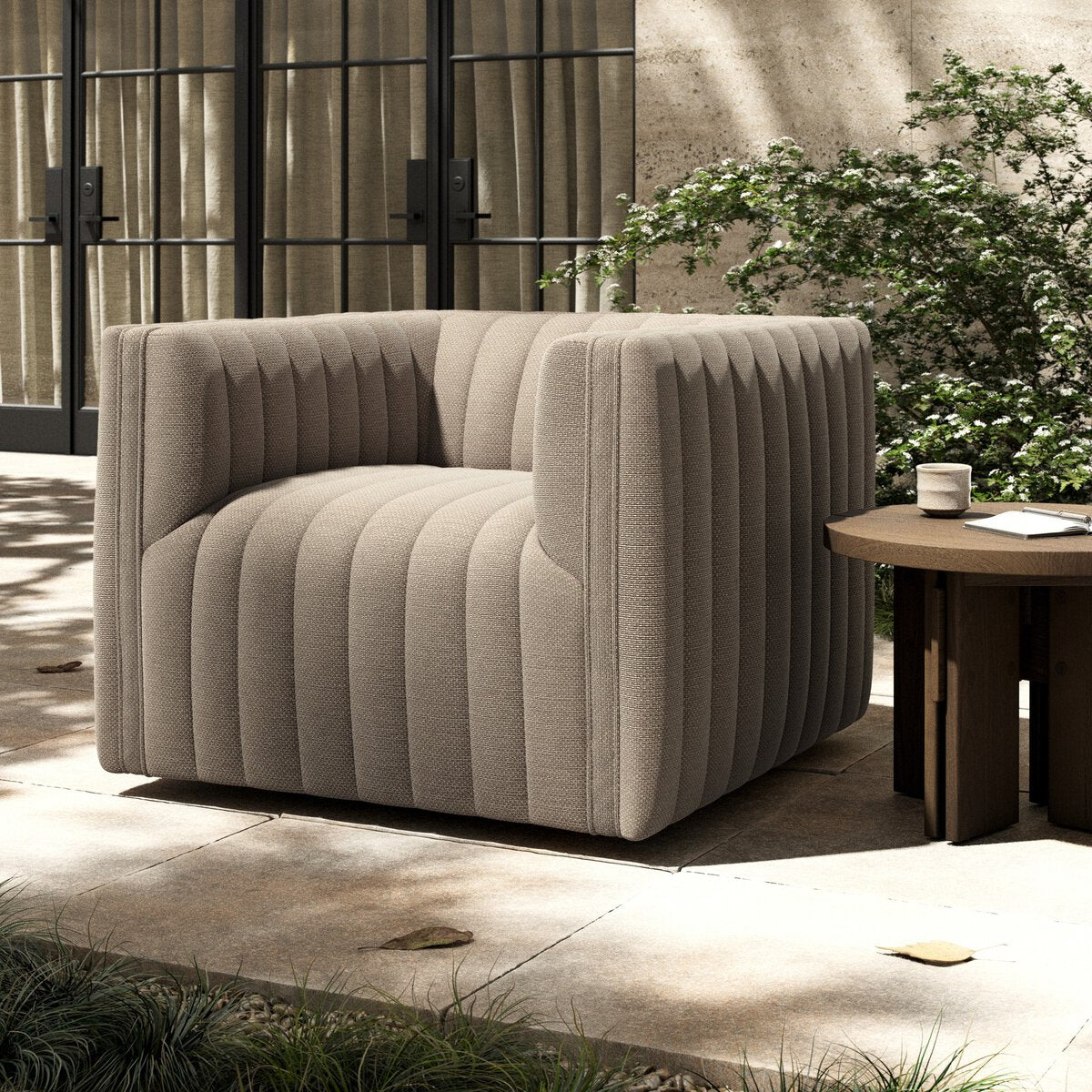 Channel-Tufted Outdoor Swivel Club Chair - Styled View